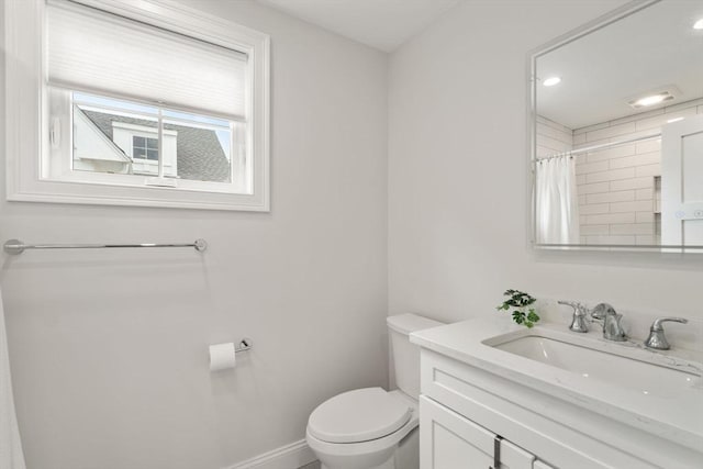 94 Webster Unit 94, Newton, MA 02465 - full bathroom with toilet, vanity, curtained shower, and baseboards