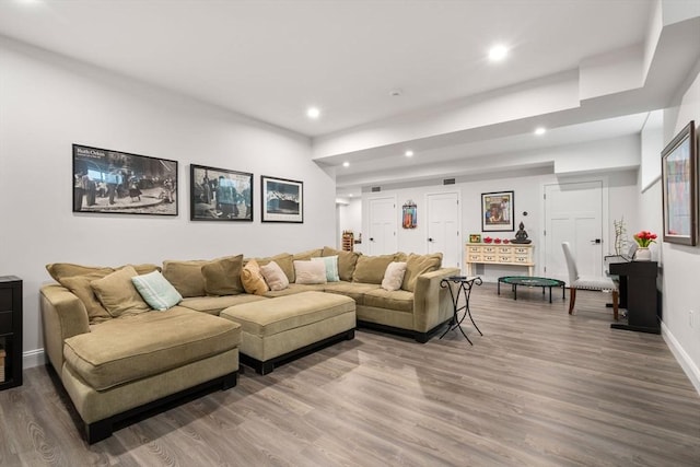94 Webster Unit 94, Newton, MA 02465 - living room with recessed lighting, wood finished floors, and baseboards