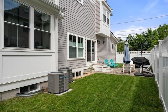 94 Webster Unit 94, Newton, MA 02465 - view of yard with central air condition unit and a patio