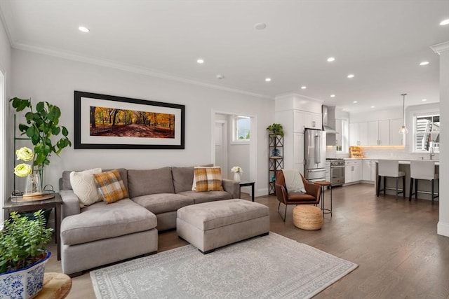 94 Webster Unit 94, Newton, MA 02465 - living area featuring recessed lighting, wood finished floors, ornamental molding, and baseboards