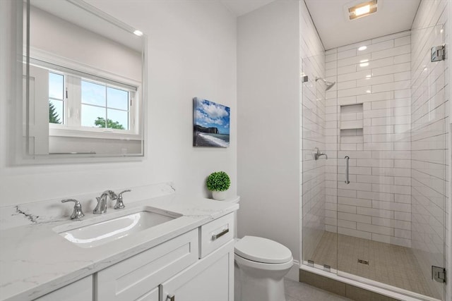 94 Webster Unit 94, Newton, MA 02465 - bathroom with toilet, vanity, and a shower stall