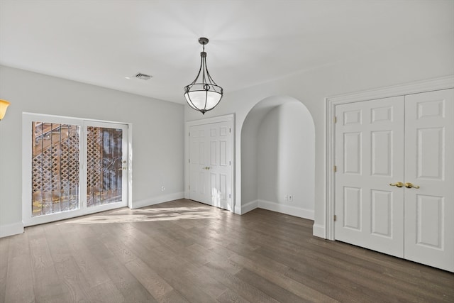 interior space with hardwood / wood-style floors