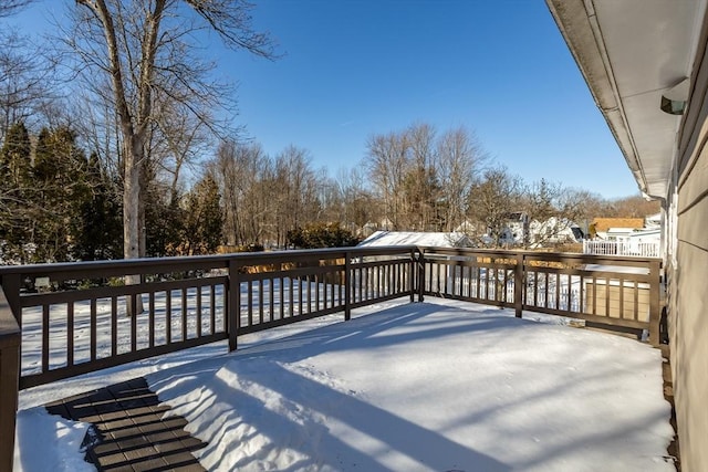 view of snow covered deck