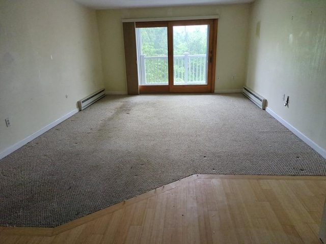 42 Old Colony Way Unit 30, Orleans, MA 02653 - unfurnished room featuring a baseboard heating unit and carpet