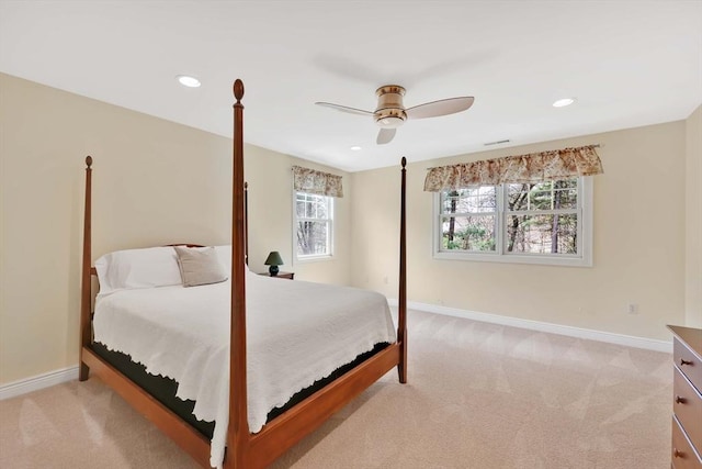 bedroom featuring baseboards, recessed lighting, ceiling fan, and light colored carpet