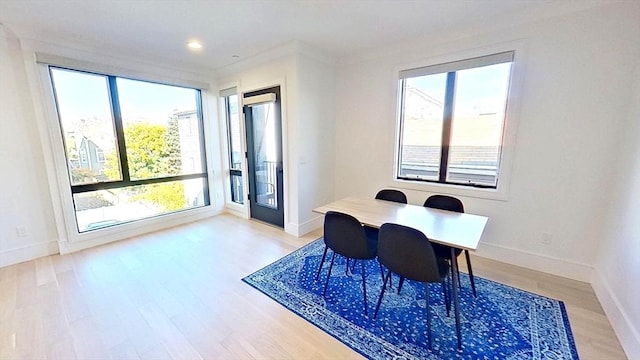 148 W 9th St Unit 6, Boston, MA 02127 - dining area with light wood-style flooring and recessed lighting