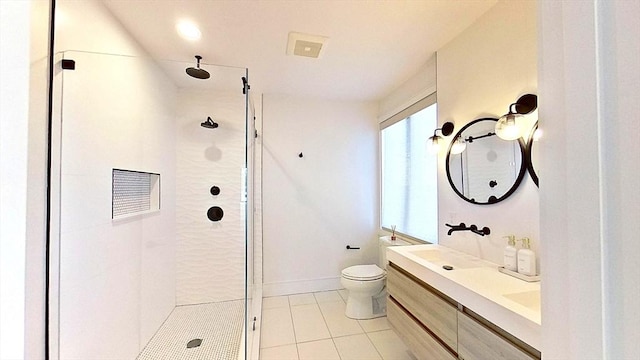 148 W 9th St Unit 6, Boston, MA 02127 - full bath featuring a tile shower, double vanity, and tile patterned flooring
