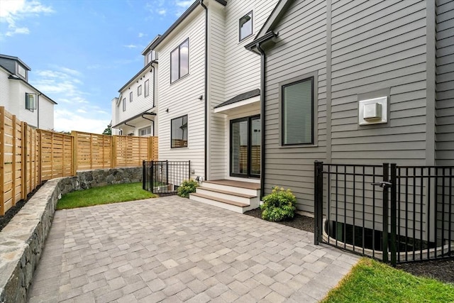 7 Johnson Pl Unit 7, Newton, MA 02466 - fenced backyard with a gate and a patio