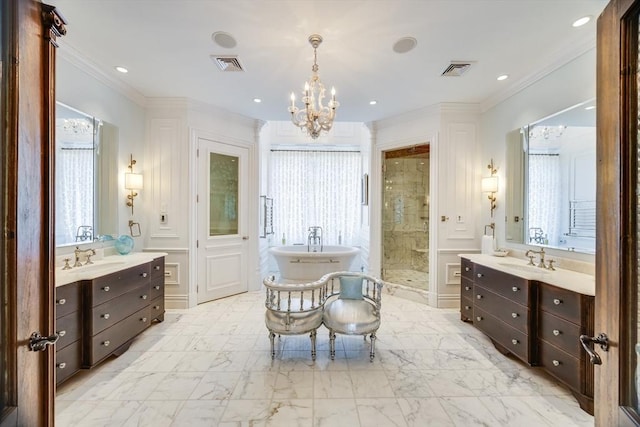 bathroom featuring vanity, ornamental molding, independent shower and bath, and an inviting chandelier