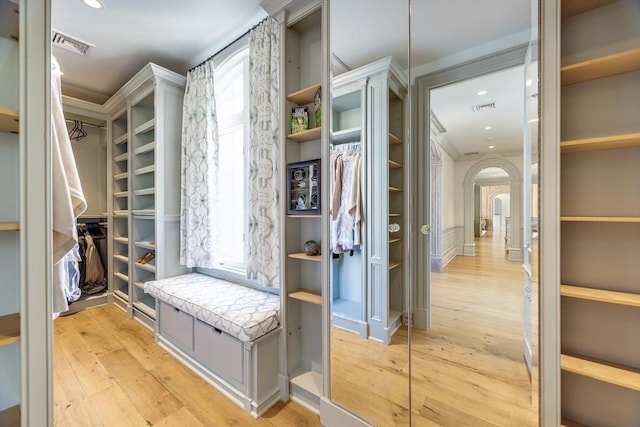 mudroom featuring a wealth of natural light and light hardwood / wood-style floors