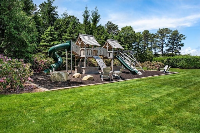 view of playground with a lawn