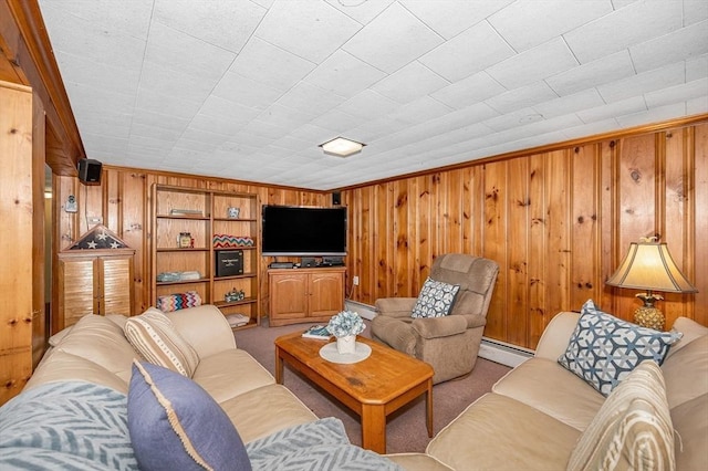 living room featuring a baseboard heating unit, wooden walls, built in features, and carpet