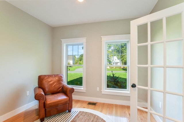 living area with light hardwood / wood-style floors