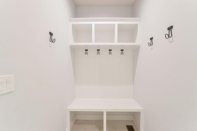 mudroom with tile patterned floors