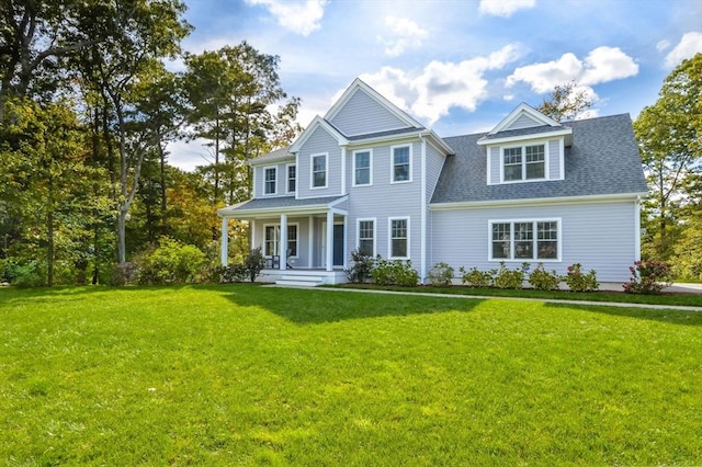 view of front of home featuring a front lawn and a porch