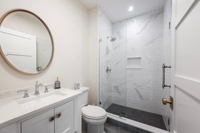 full bath with vanity, recessed lighting, toilet, and a shower stall