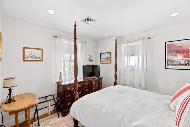 bedroom with light hardwood / wood-style flooring