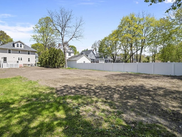 view of yard featuring fence