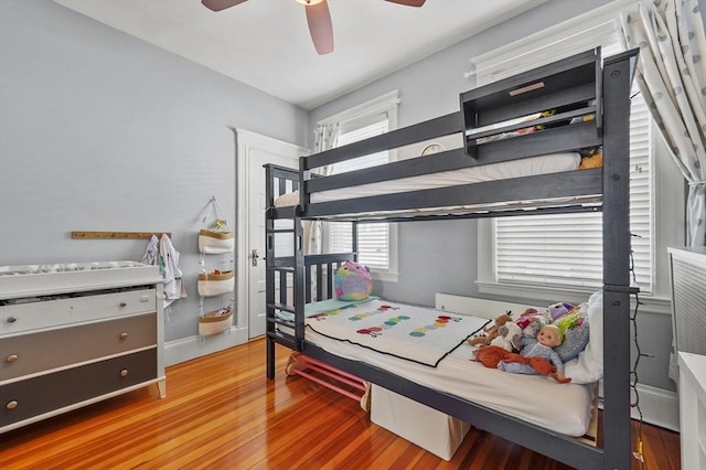 46 Converse Ave Unit 1, Malden, MA 02148 - bedroom featuring wood finished floors, a ceiling fan, and baseboards