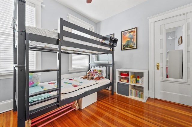 46 Converse Ave Unit 1, Malden, MA 02148 - bedroom featuring wood finished floors, baseboards, and a ceiling fan