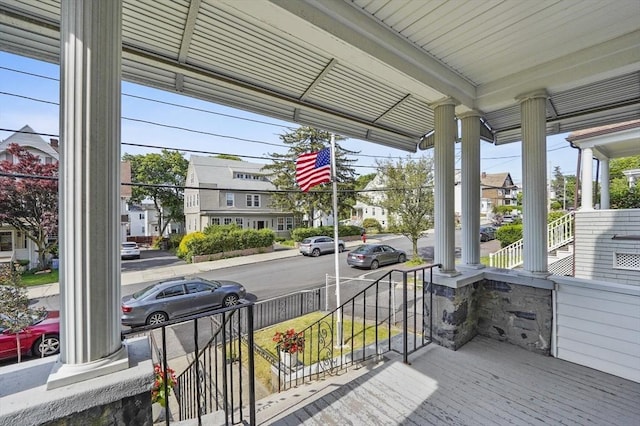 46 Converse Ave Unit 1, Malden, MA 02148 - wooden porch featuring a residential view