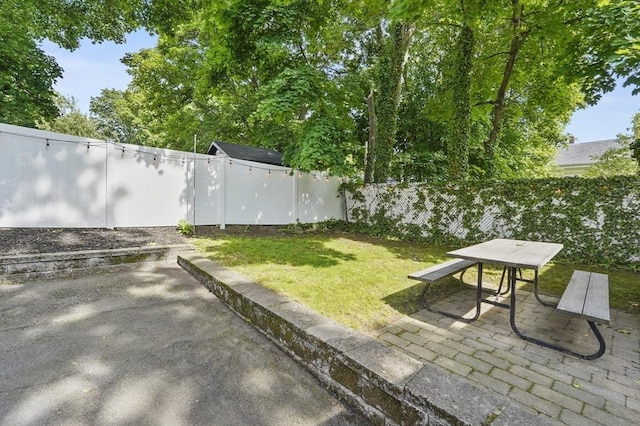 46 Converse Ave Unit 1, Malden, MA 02148 - view of yard featuring a patio area and outdoor dining area