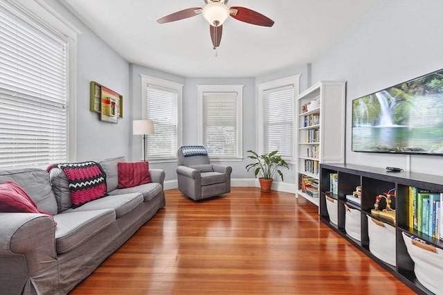 46 Converse Ave Unit 1, Malden, MA 02148 - living room with wood finished floors, a ceiling fan, and baseboards