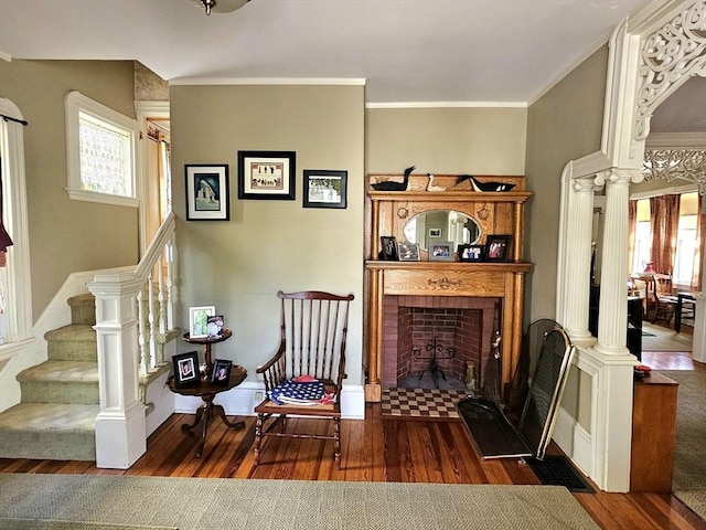 308 Hawthorn St, New Bedford, MA 02740 - living area featuring decorative columns, healthy amount of natural light, hardwood / wood-style floors, and ornamental molding