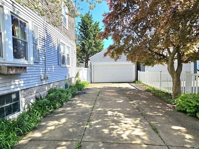 308 Hawthorn St, New Bedford, MA 02740 - view of home's exterior featuring an outdoor structure and fence