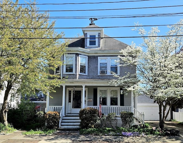 308 Hawthorn St, New Bedford, MA 02740 - traditional style home with covered porch, a garage, an outbuilding, and roof with shingles