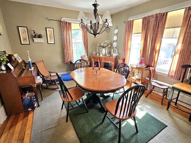 308 Hawthorn St, New Bedford, MA 02740 - dining area with a chandelier and wood finished floors