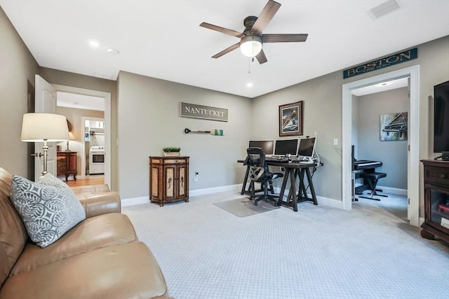 office space featuring ceiling fan, carpet floors, washer / dryer, baseboards, and recessed lighting