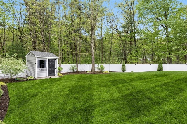 view of yard featuring a storage unit and an outdoor structure