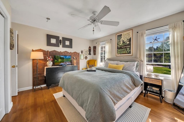 28 Sewall St, Shrewsbury, MA 01545 - bedroom featuring multiple windows, wood finished floors, ceiling fan, and baseboards