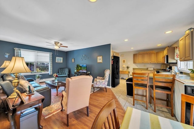 28 Sewall St, Shrewsbury, MA 01545 - living room featuring a baseboard radiator, ceiling fan, recessed lighting, and baseboards