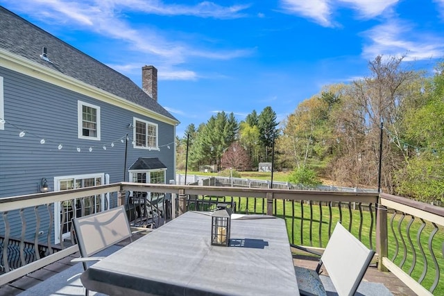 28 Sewall St, Shrewsbury, MA 01545 - wooden deck featuring outdoor dining space and a lawn