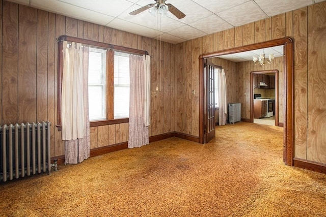100 Weetamoe St, Fall River, MA 02720 - unfurnished room with radiator heating unit, ceiling fan, carpet, and a chandelier