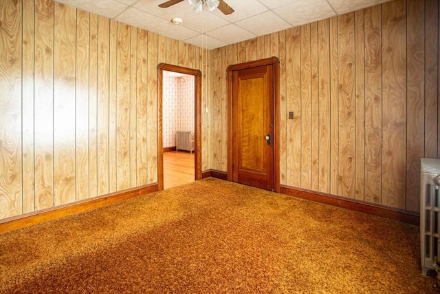 100 Weetamoe St, Fall River, MA 02720 - empty room with radiator, carpet, ceiling fan, and a smoke detector