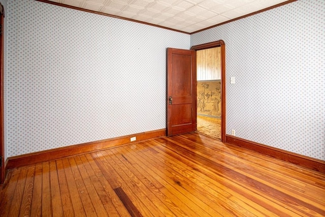 100 Weetamoe St, Fall River, MA 02720 - empty room featuring ornamental molding and light wood finished floors