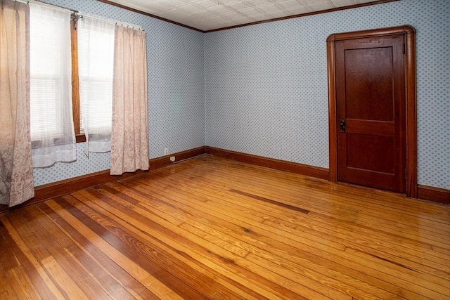 100 Weetamoe St, Fall River, MA 02720 - empty room with light wood-style floors and crown molding
