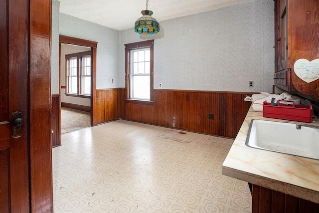 100 Weetamoe St, Fall River, MA 02720 - unfurnished dining area featuring a wainscoted wall and wood walls