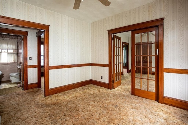 100 Weetamoe St, Fall River, MA 02720 - carpeted spare room with french doors and ceiling fan