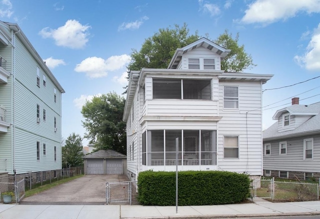100 Weetamoe St, Fall River, MA 02720 - view of front of home featuring a gate, a garage, and an outbuilding