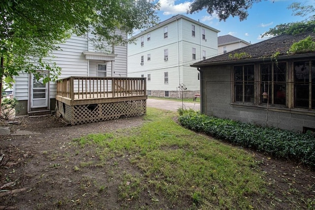 100 Weetamoe St, Fall River, MA 02720 - rear view of house with a wooden deck