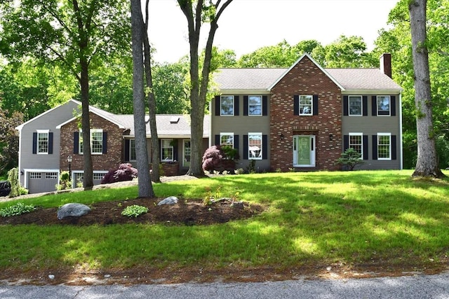 1820 Milk St, Dighton, MA 02715 - colonial home with a chimney, a garage, a front yard, and brick siding