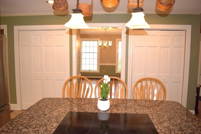 1820 Milk St, Dighton, MA 02715 - dining room with crown molding and a chandelier