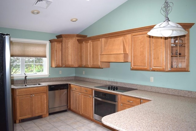 1820 Milk St, Dighton, MA 02715 - kitchen with stainless steel appliances, custom range hood, a sink, lofted ceiling, and brown cabinets