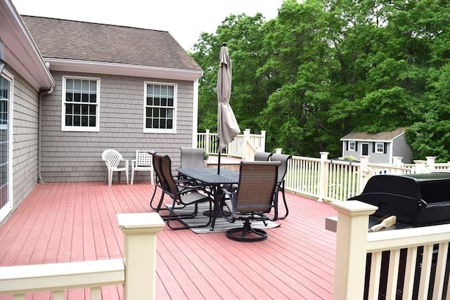 1820 Milk St, Dighton, MA 02715 - wooden deck with outdoor dining area