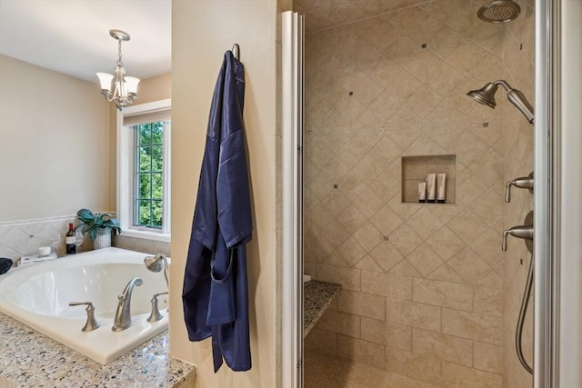 35 Michael Way Unit 29, Andover, MA 01810 - bathroom featuring a shower stall, a bath, and a chandelier