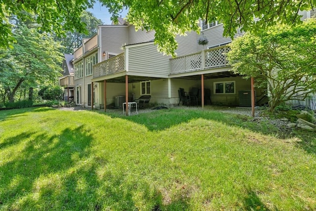35 Michael Way Unit 29, Andover, MA 01810 - back of house with a lawn and a wooden deck